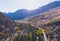 Aerial autumn fall view aerial drone view of Mono County, Inyo National Forest, with forest, mountains, road in summer day,