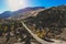 Aerial autumn fall view aerial drone view of Mono County, Inyo National Forest, with forest, mountains, road in summer day,