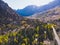 Aerial autumn fall view aerial drone view of Mono County, Inyo National Forest, with forest, mountains, road in summer day,