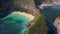 Aerial back tracking on stunning tropical Paradise beach and Cliff in Nusa Penida island of Bali Indonesia of Asia