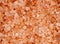 Aerial background macro texture of pink red himalayan salt