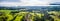 Aerial Bad Toelz Bavarian Alps. Golf Course. Blomberg Mountain. Morning Drone Shot with some clouds in the sky