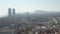 Aerial: Barcelona wide drone of hazy cityscape