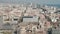 Aerial: Barcelona wide drone shot of city towards skyline cityscape