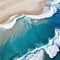 Aerial beach top view above seashore with blue wave and white frothy summer