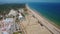Aerial. Beautiful view from the sky of the beach and the village of Monte Gordo. Portugal