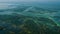 Aerial of big river with small islands full of blue green algae