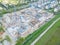 Aerial Bird Eye View Of a Construction Site Building Cranes Looking Down Industrial Machinery Area around Residential Urban