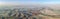 Aerial or bird panoramic view on green Negev fields at sunrise time