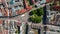 Aerial birds eye overhead top down view small square with trees in city centre. Ascending footage of University square