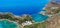 Aerial birds eye view drone photo Anthony Quinn and Ladiko bay on Rhodes island, Dodecanese, Greece. Panorama with nice lagoon and