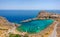 Aerial birds eye view drone photo Saint Paul bay near village Lindos, Rhodes island, Dodecanese, Greece. Sunny panorama with