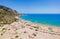 Aerial birds eye view drone photo Tsambika beach near Kolympia on Rhodes island, Dodecanese, Greece. Sunny panorama with sand