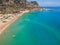 Aerial birds eye view drone photo Tsambika beach near Kolympia on Rhodes island, Dodecanese, Greece. Sunny panorama with sand