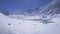 Aerial birds eye view fly over group of trekkers on famous Tilicho lake by small lake. Nepal popular treks. Manang