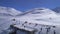 Aerial birds eye view fly over group of trekkers on viewpoint of Tilicho lake trek in high mountains. Nepal popular