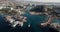 Aerial birds eye view video taken of Eilat, Israel. A Drone shot city landscape view of tourist city in the desert with