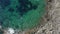 AERIAL: Birdsview of beautiful Ocean Blue Water on Rock Coast on Tropical Island Mallorca, Spail Vacation, Travel, Sunny