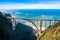 Aerial Bixby Bridge Rocky Creek Bridge and Pacific Coast Highway near Big Sur in California, USA. Drone Shot
