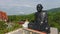 Aerial: Black Monk Statue At Buddhism Temple in Phang Nga Province. Popular Touristic Place Birds Eye Drone View. HD.