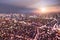 Aerial bokeh of Tokyo skyline from above during sunset