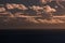 Aerial breathtaking view of artistic cloudscape over the dark sea