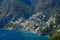 AERIAL: Breathtaking view of the famous Positano coast on a sunny summer day.