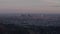 Aerial: breathtaking view over Hollywood hills with Los Angeles cityscape in beautiful sunset light