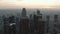 AERIAL: Breathtaking wide shot backing up from Downtown Los Angeles, California Skyline at Sunset