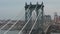 Aerial: bridge with east river and New York City Skyline