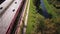 Aerial: the camera follows a bike on the highway, having fun and enjoying the road