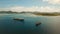 Aerial Cargo and passenger ships in the sea. Philippines, Siargao.