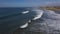 Aerial Carlsbad California surfing waves coast 4K 288