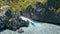 Aerial circling movement around Matinloc Shrine. El Nido, Palawan, Philippines. Bizarre limestone rocks and lonely boat