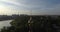 Aerial cityscape at sunset with golden dome of Orthodox church, Russia