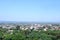 Aerial cityscape view of Moshi buildings with green trees and houses in Tanzania