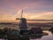 Aerial of classic dutch windmills at the Zaanse Schans during a stunning sunrise