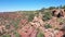 Aerial cliff southwest red rock beautiful desert Kanab Utah pull 4K