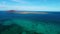 Aerial clip of the stunning tropical looking volcanic island of Lobos