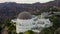 Aerial: close up of Griffith Observatory with Hollywood Hills in Daylight, Los Angeles, California, Cloudy