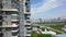 Aerial close-up of a high-rise residential building by the river in Nanning, Guangxi, China