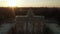 Aerial: close up of Quadriga Green Statue on Brandenburger Tor in Berlin, Germany in beautiful Sunset light