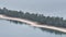 Aerial closeup of beach and trees on Amanohashidate sand bar