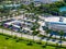 Aerial closeup drone photo Porsche West Broward a luxury automotive dealer