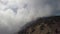 Aerial of clouds blowing over mountain Kokiya Kala Kokiya-Kaya-Bash near Aya Cape