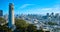 Aerial Coit Tower on Telegraph Hill with view of San Francisco city on blue sky day