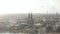 Aerial: Cologne Hohenzollern Bridge and View on Cathedral with Central Train Station in beautiful hazy Sunlight