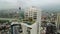 Aerial Colombo cityscape with prominent Lotus Tower amid urban skyline. Modern architecture, high-rises surround