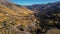 Aerial Colorado Curved Mountain Road Autumn Fly Backwards