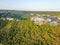 Aerial colorful restaurant and vacation homes in lush green fore